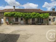 Maison à AUBIGNE