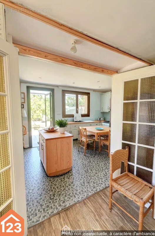 Cuisine dinatoire ouverte sur le jardin-Ambiance optimisée ? volumes conformes - Maison à RENNES