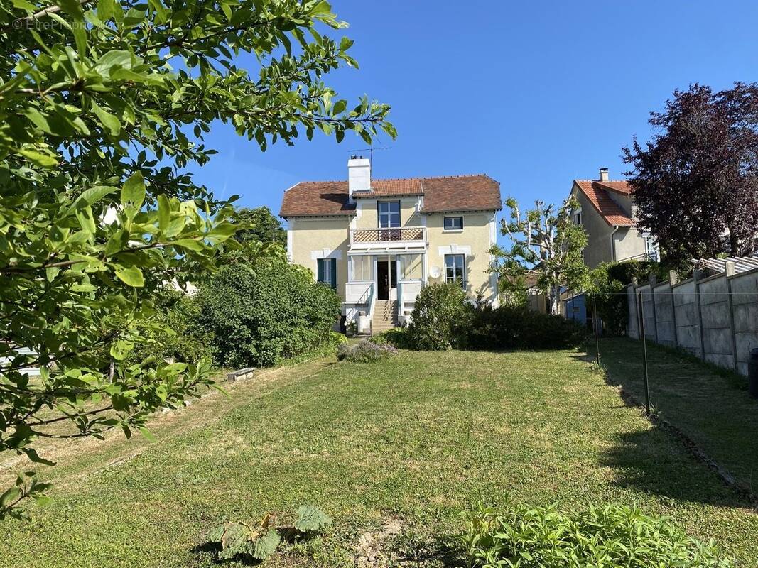 Façade arrière - Maison à COULOMMIERS