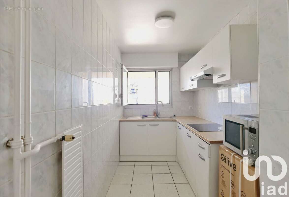 Photo 4 - Appartement à PARIS-19E