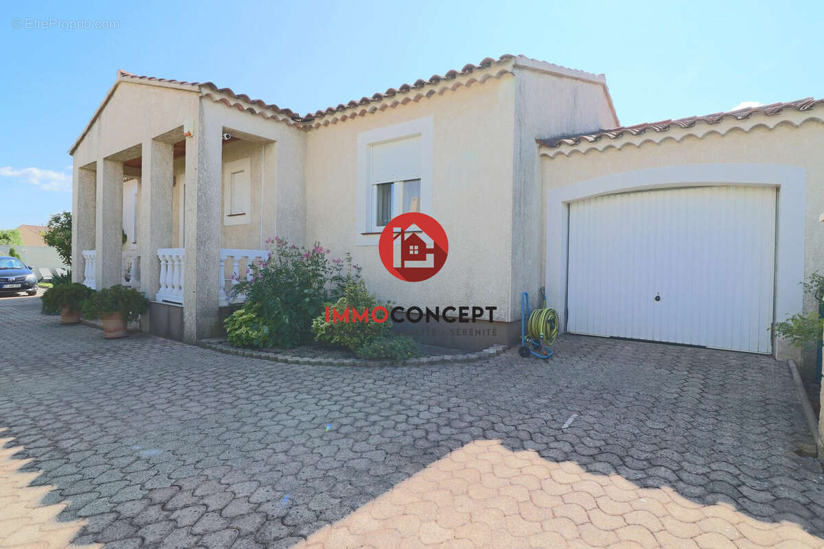 Maison à LAUDUN-L&#039;ARDOISE