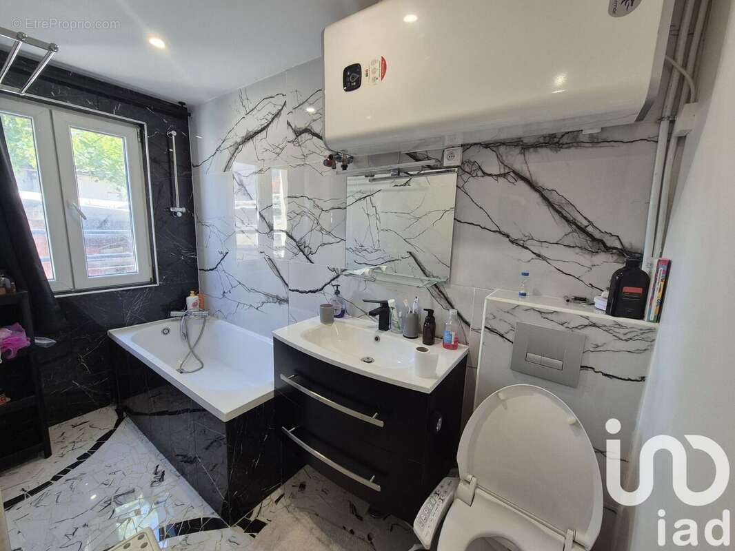 Photo 4 - Appartement à LA FERTE-SOUS-JOUARRE