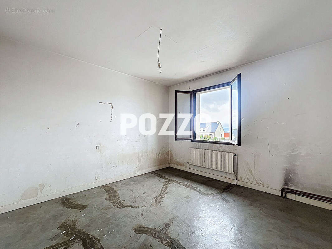 Maison à JUVIGNY-LE-TERTRE