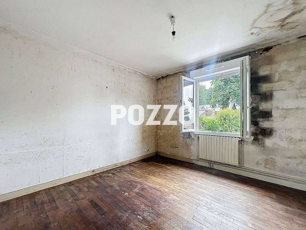 Maison à JUVIGNY-LE-TERTRE