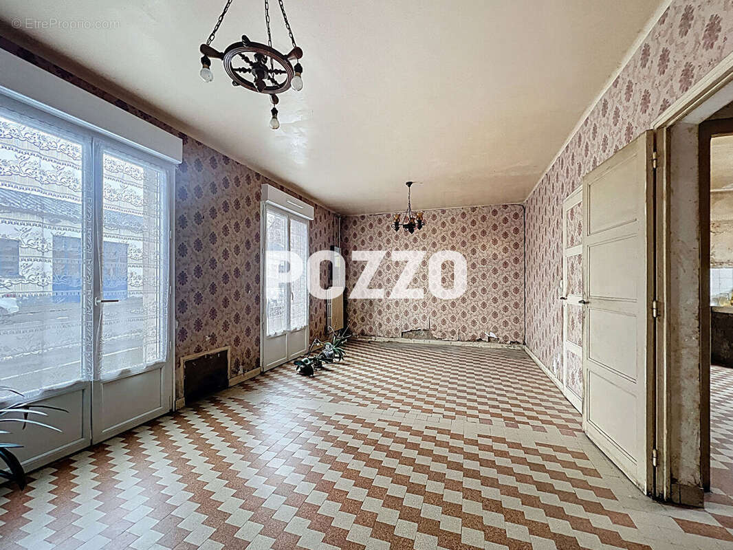 Maison à JUVIGNY-LE-TERTRE