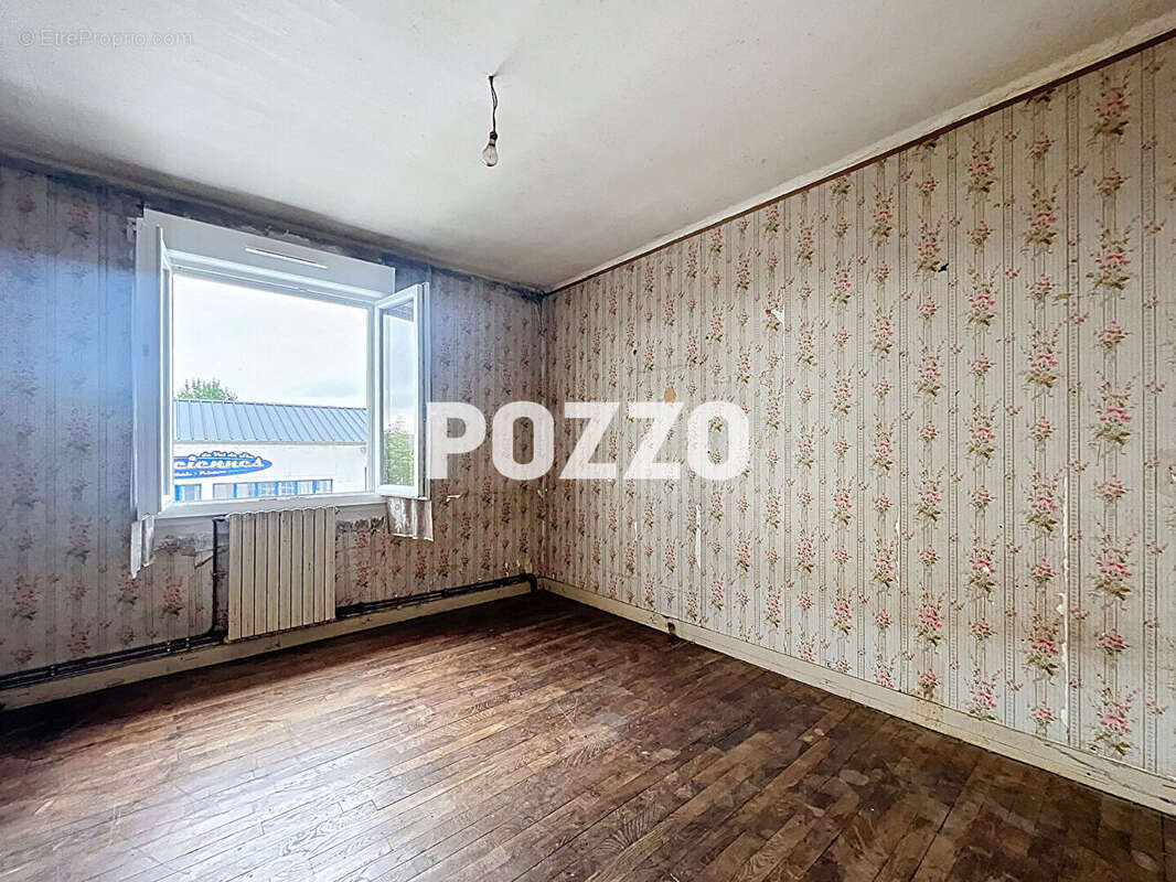 Maison à JUVIGNY-LE-TERTRE