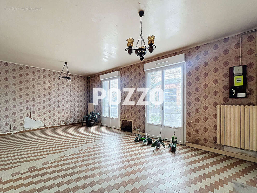 Maison à JUVIGNY-LE-TERTRE