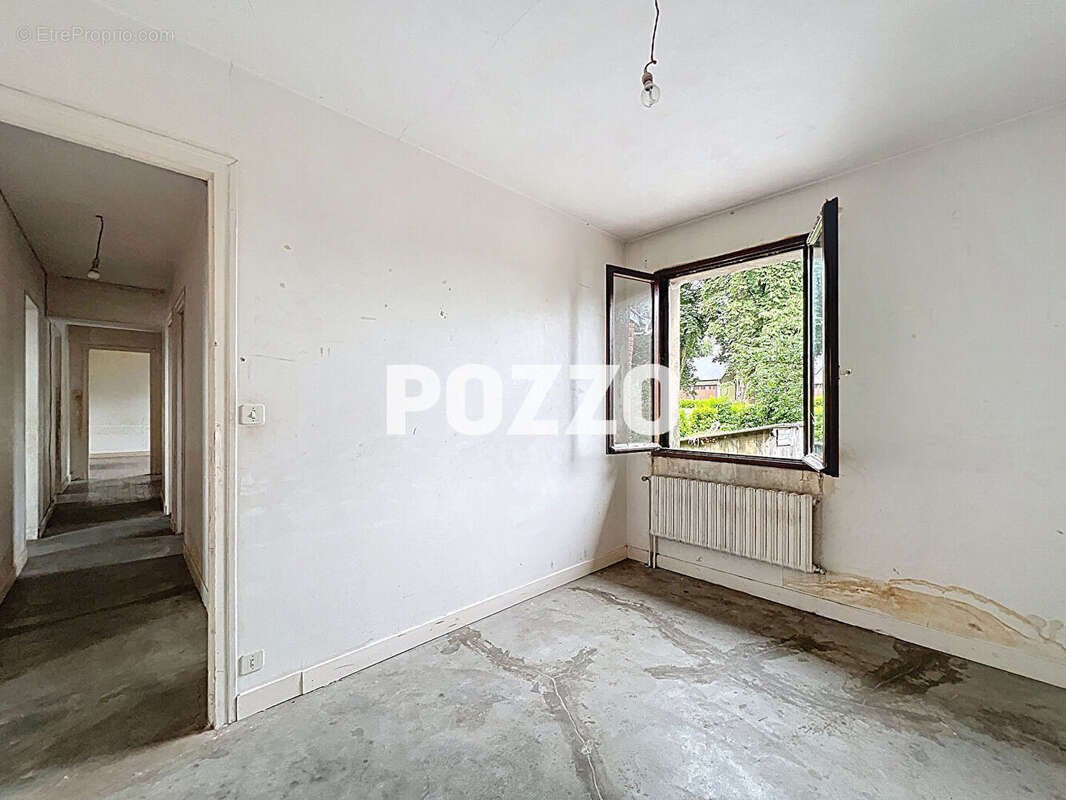 Maison à JUVIGNY-LE-TERTRE