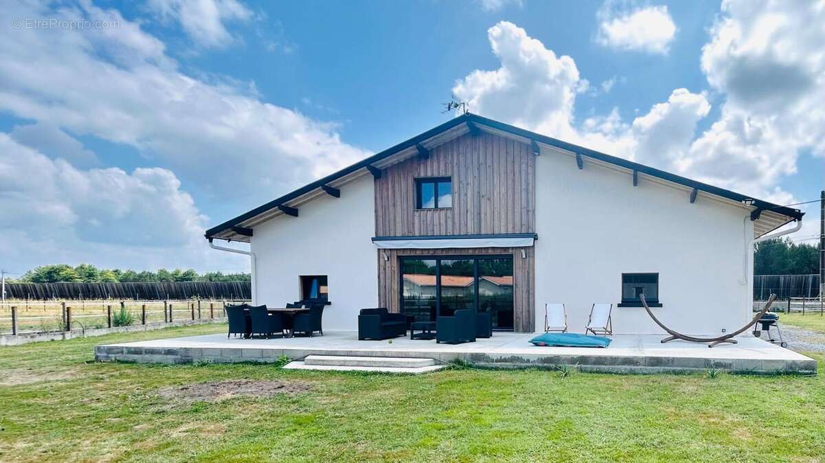 Photo 2 - Maison à SAUGNACQ-ET-MURET