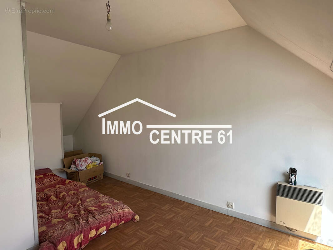 Maison à LE MENIL-DE-BRIOUZE