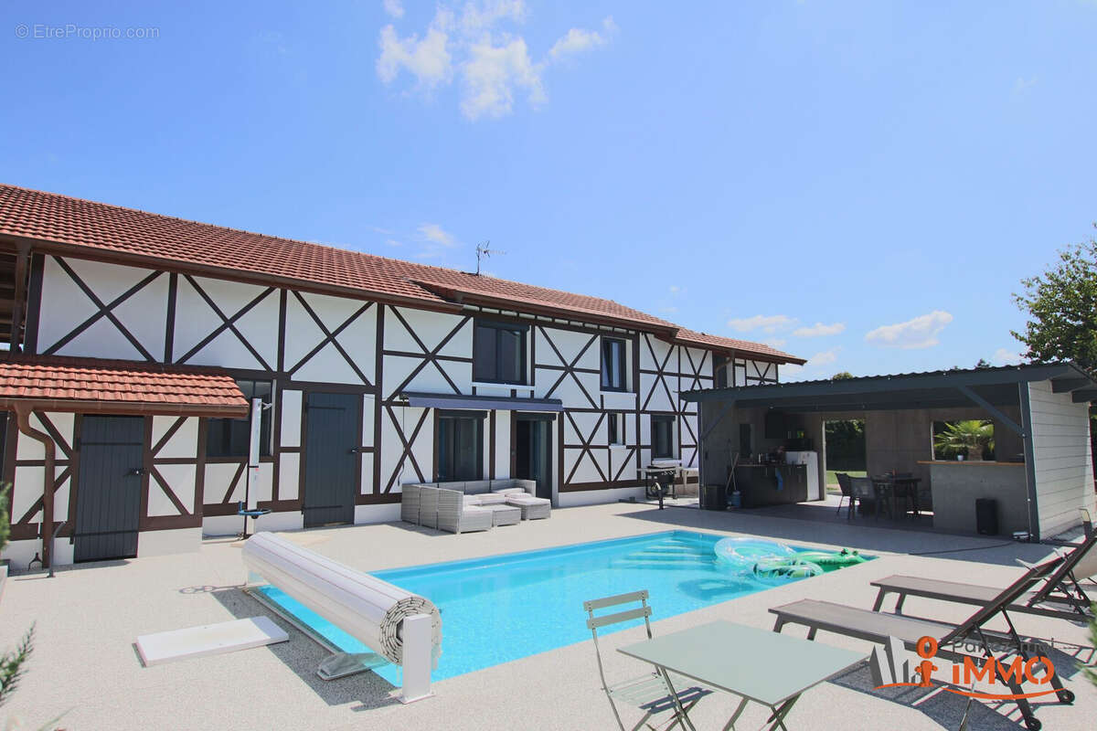 Maison à VILLIEU-LOYES-MOLLON