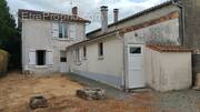 Maison à AUBIGNE
