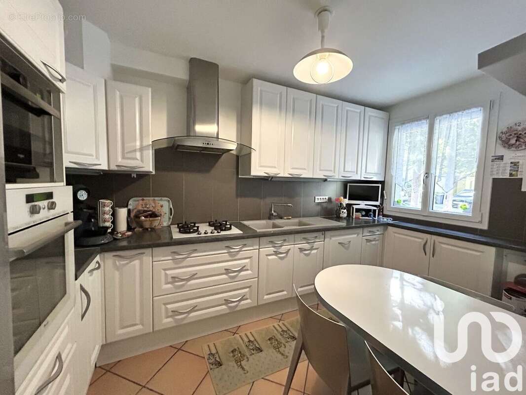 Photo 2 - Maison à LIEUSAINT