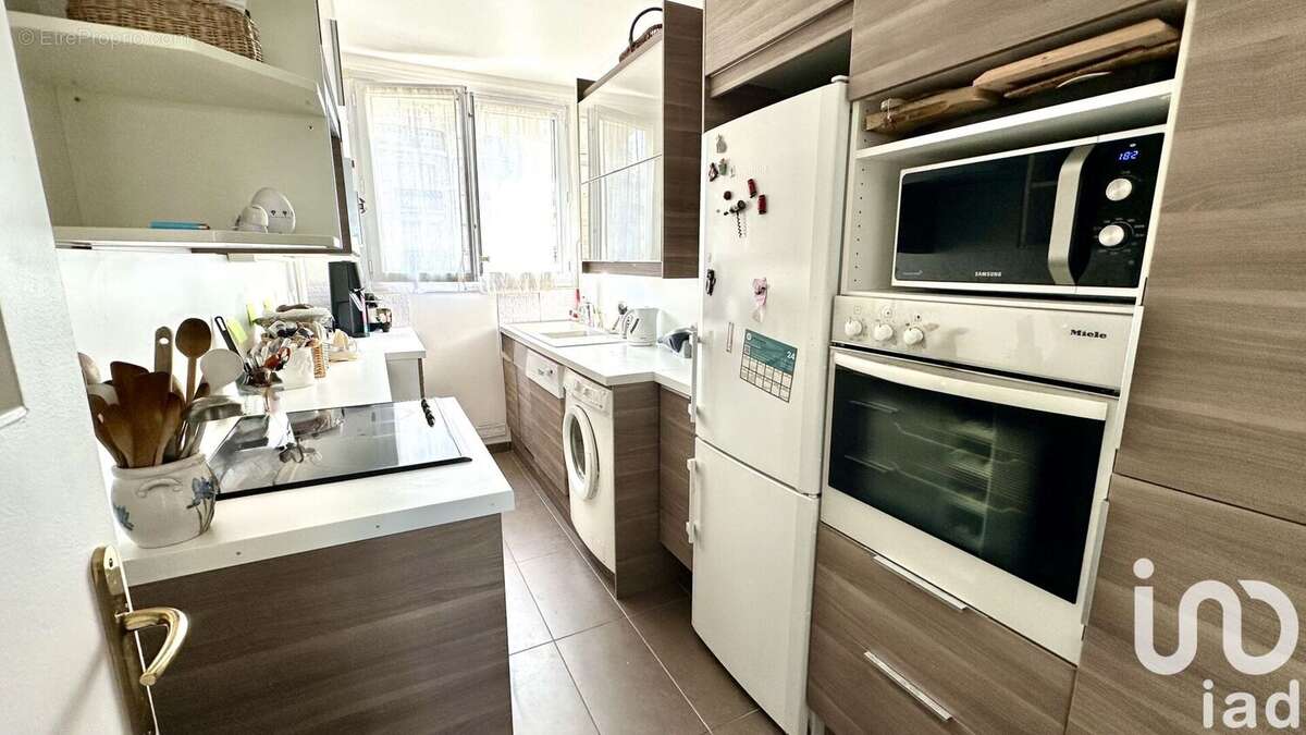 Photo 4 - Appartement à COURBEVOIE