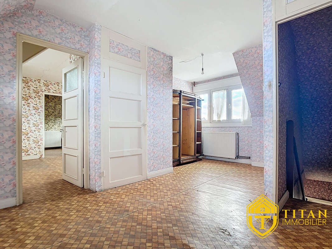 Maison mitoyenne- 5 pièces-grand jardin- garage- à Les Moëres- Titan Immobilier - Maison à REXPOEDE