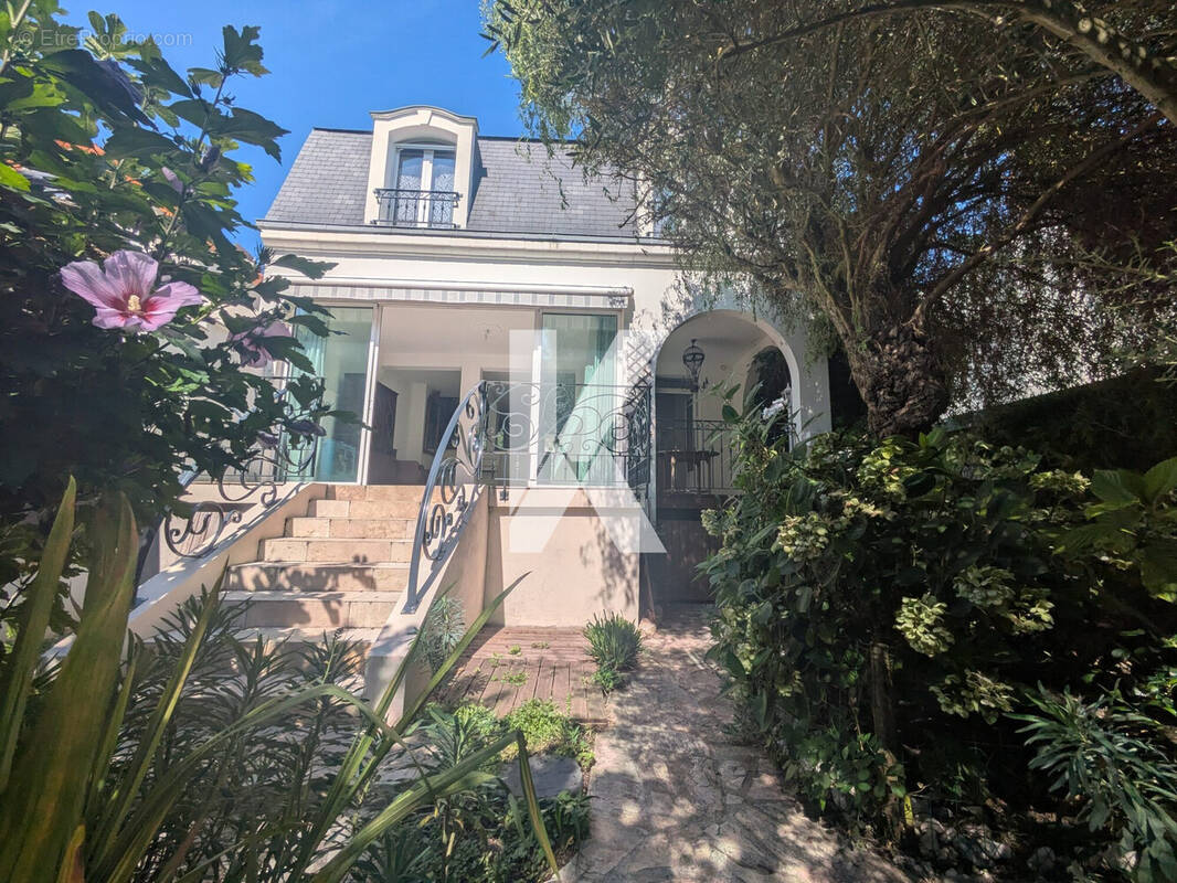 Face arrière de la maison - Maison à SOISY-SOUS-MONTMORENCY