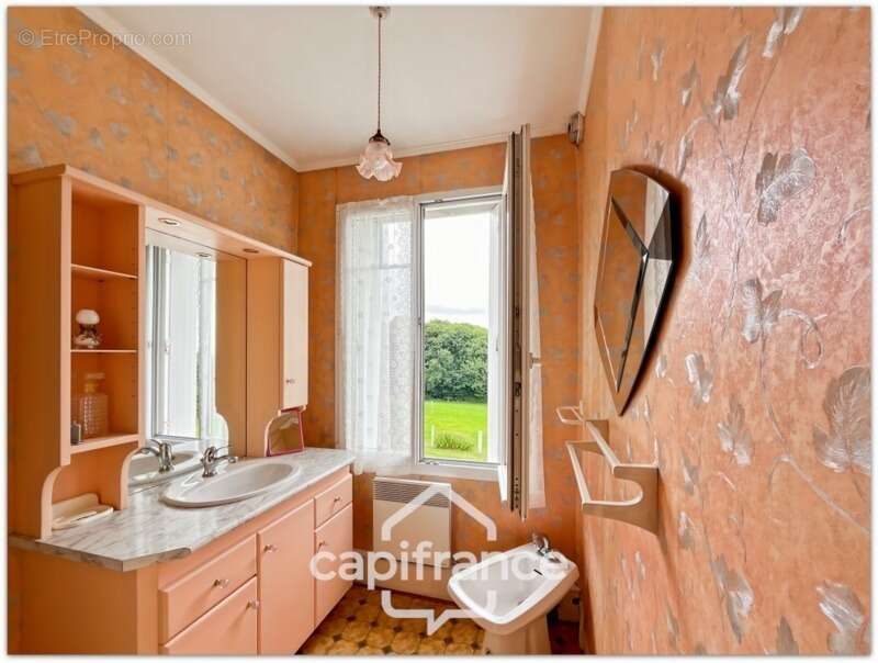 Maison à LA CHAISE-BAUDOUIN