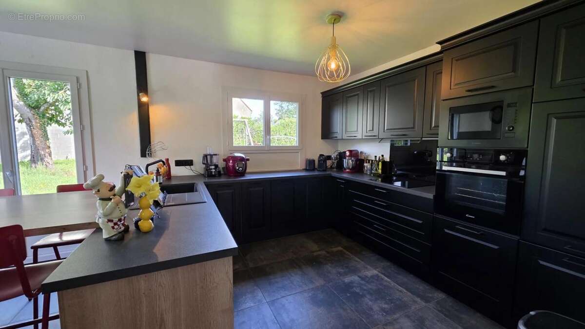 Maison à FONTAINE-LAVAGANNE