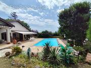 Photo 1 - Maison à SAINT-GENIS-LES-OLLIERES