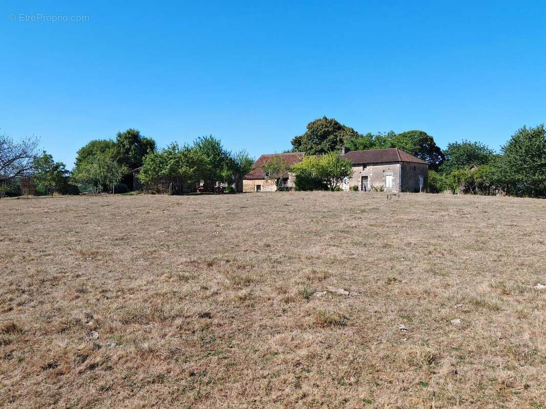 Terrain sud - Maison à THIVIERS