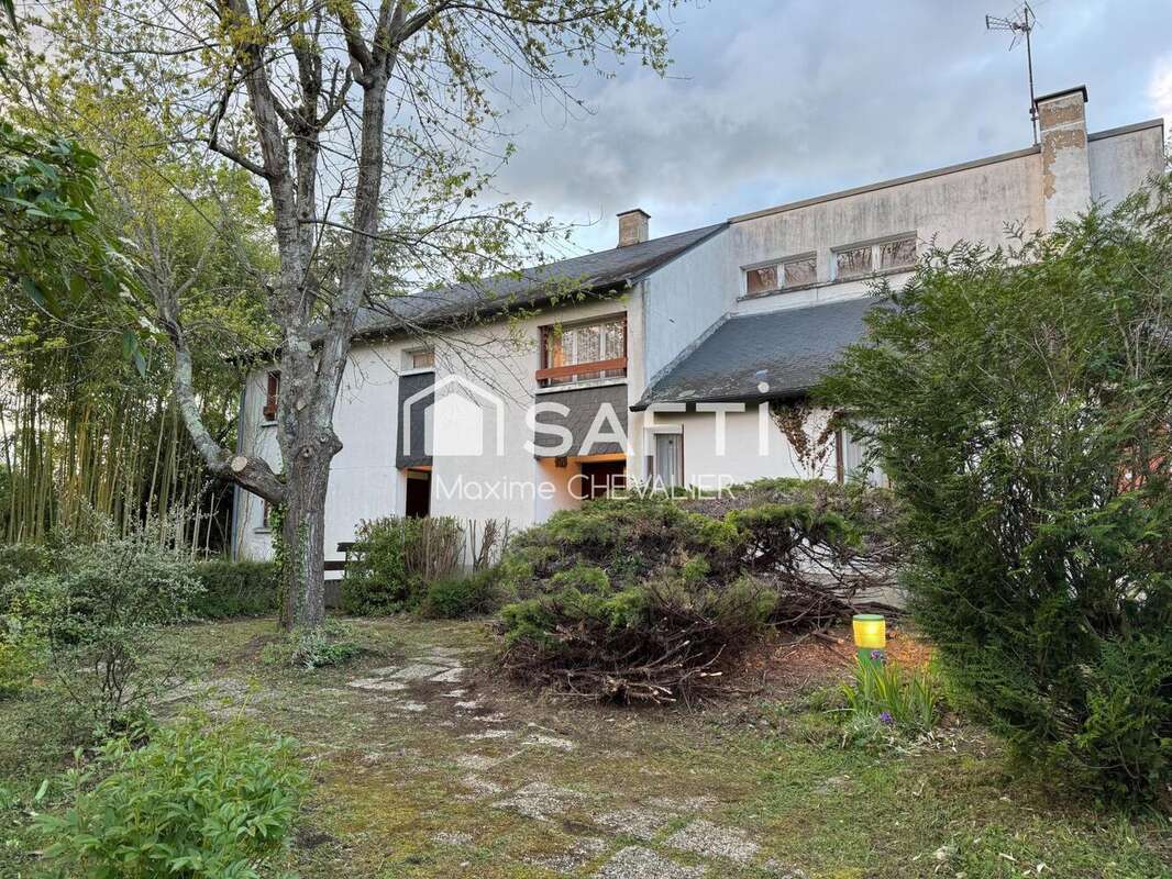 Photo 2 - Maison à NEUVY-SAINT-SEPULCHRE