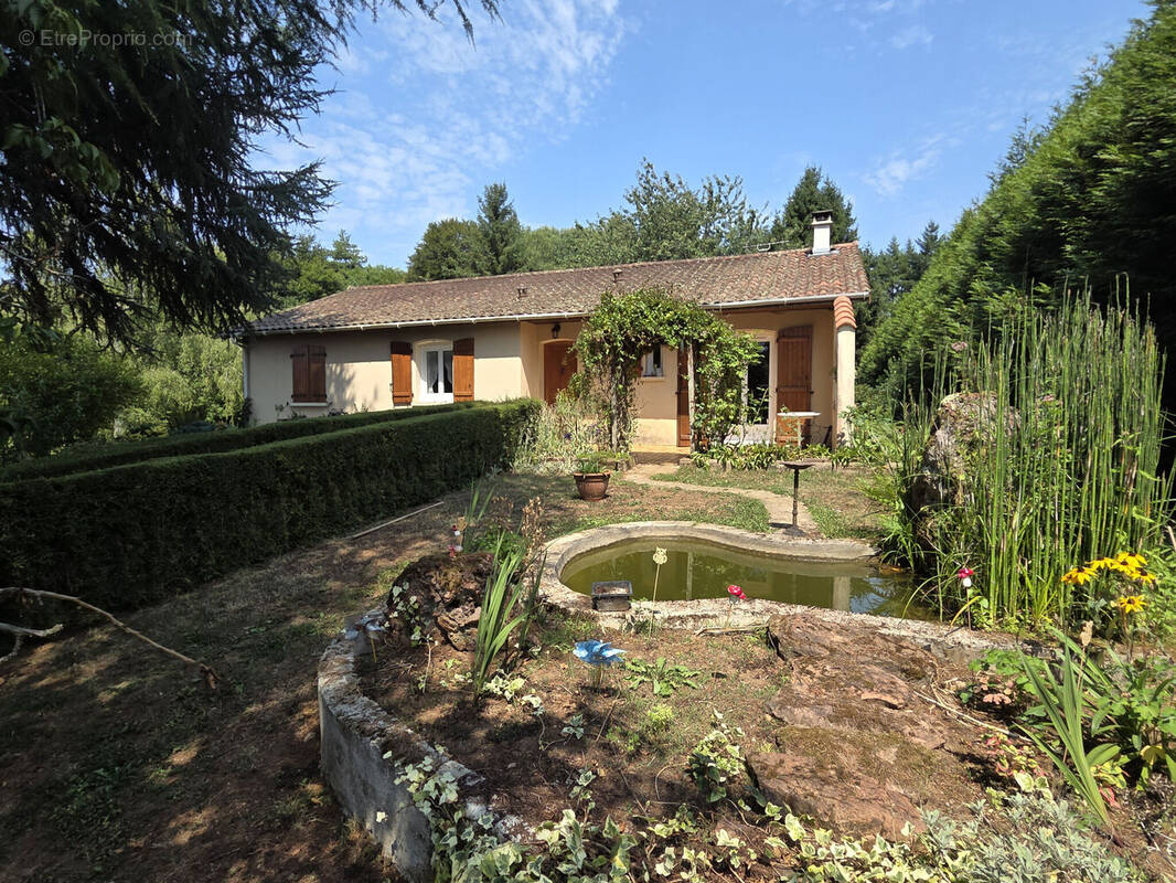 Photo 1 - Maison à SAINT-LEONARD-DE-NOBLAT