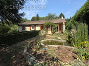 Photo 1 - Maison à SAINT-LEONARD-DE-NOBLAT