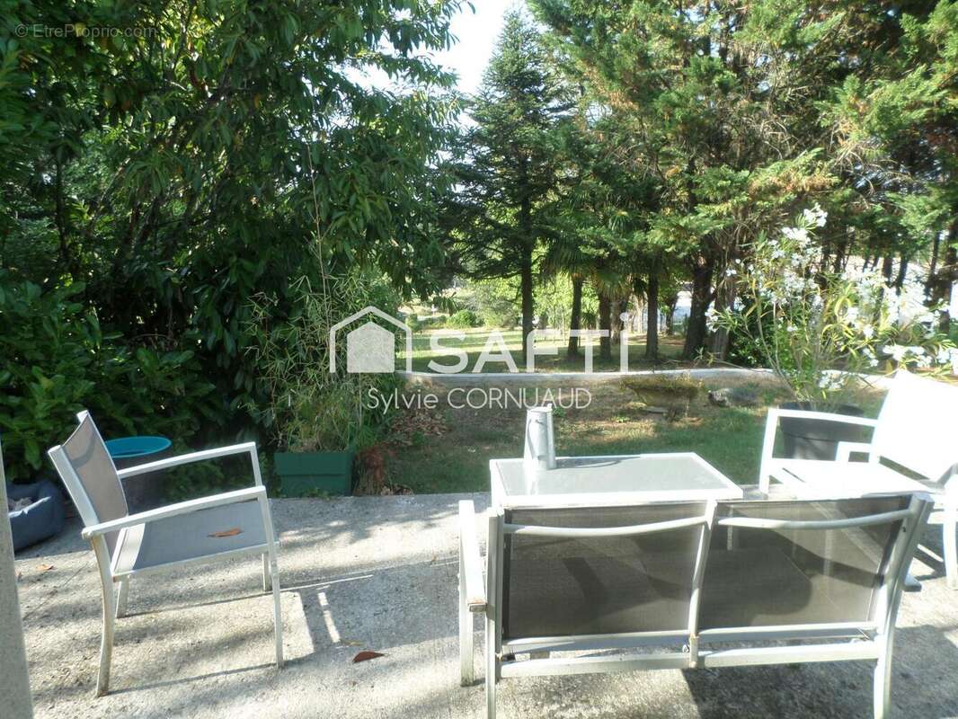 Photo 2 - Maison à LA CHAPELLE-DES-POTS