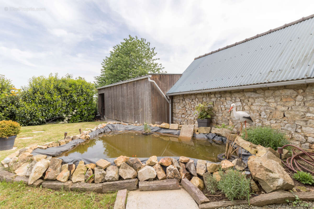 Maison à COMBOURTILLE