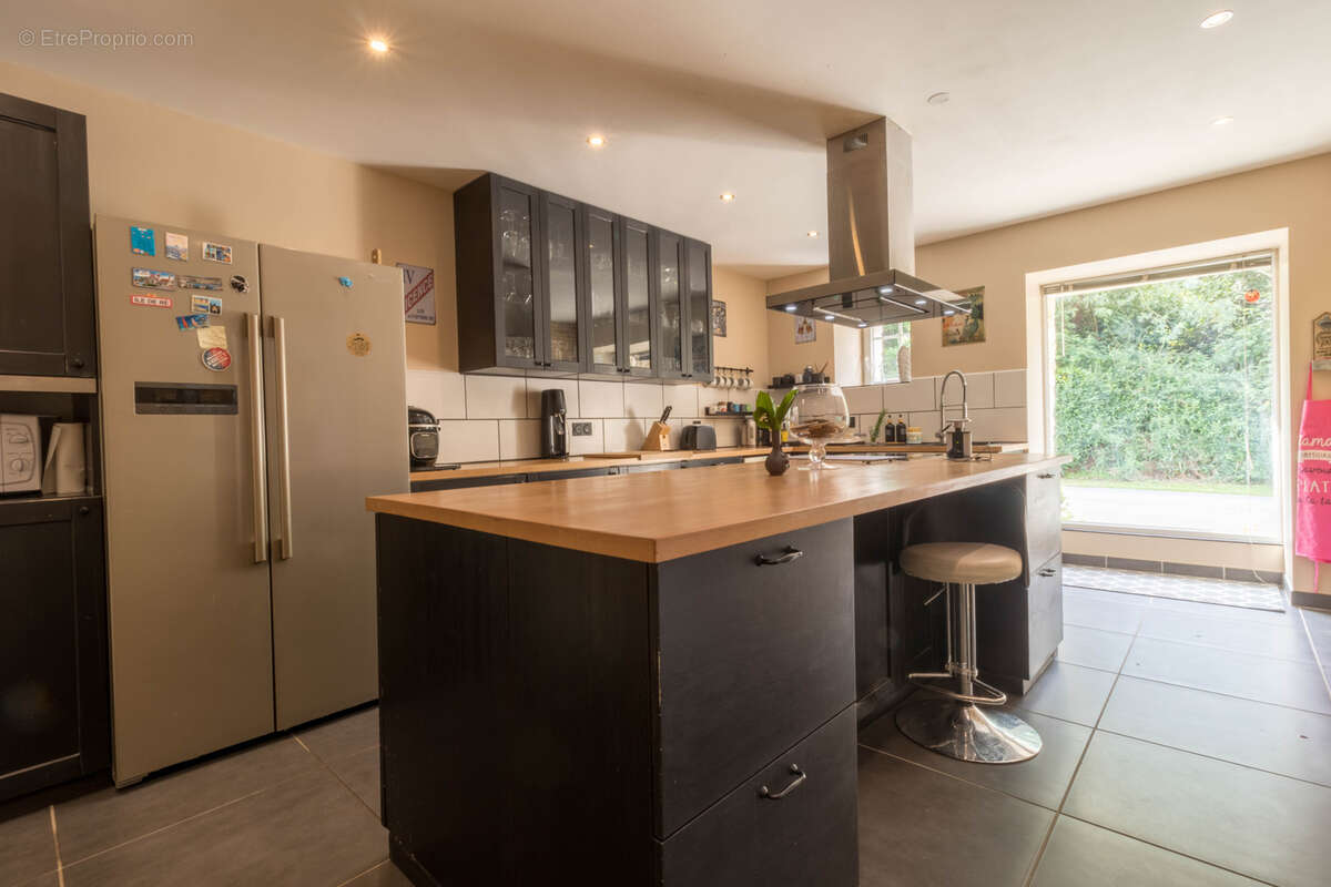 Maison à COMBOURTILLE