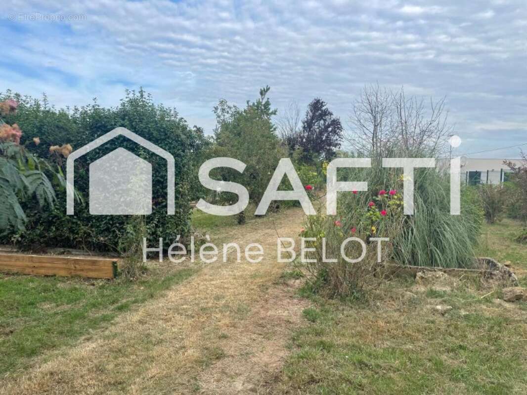 Photo 2 - Maison à SAINT-VINCENT-STERLANGES