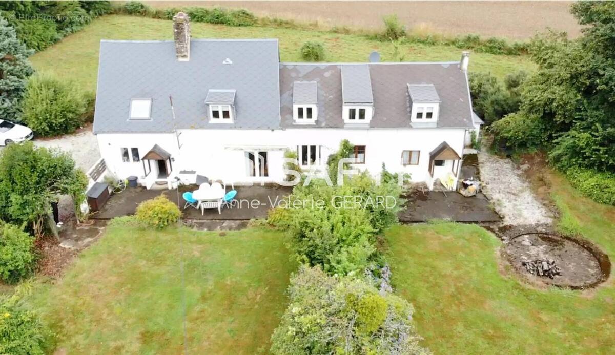 Photo 1 - Maison à JUVIGNY-LE-TERTRE