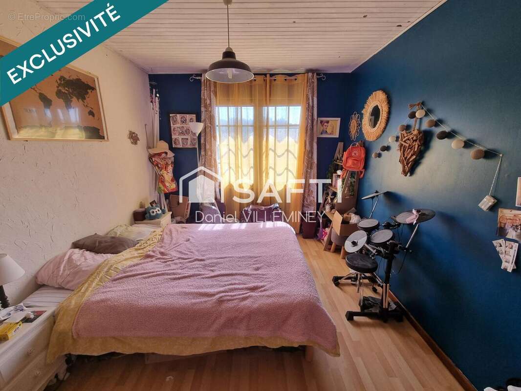 Photo 5 - Maison à AILLEVILLERS-ET-LYAUMONT