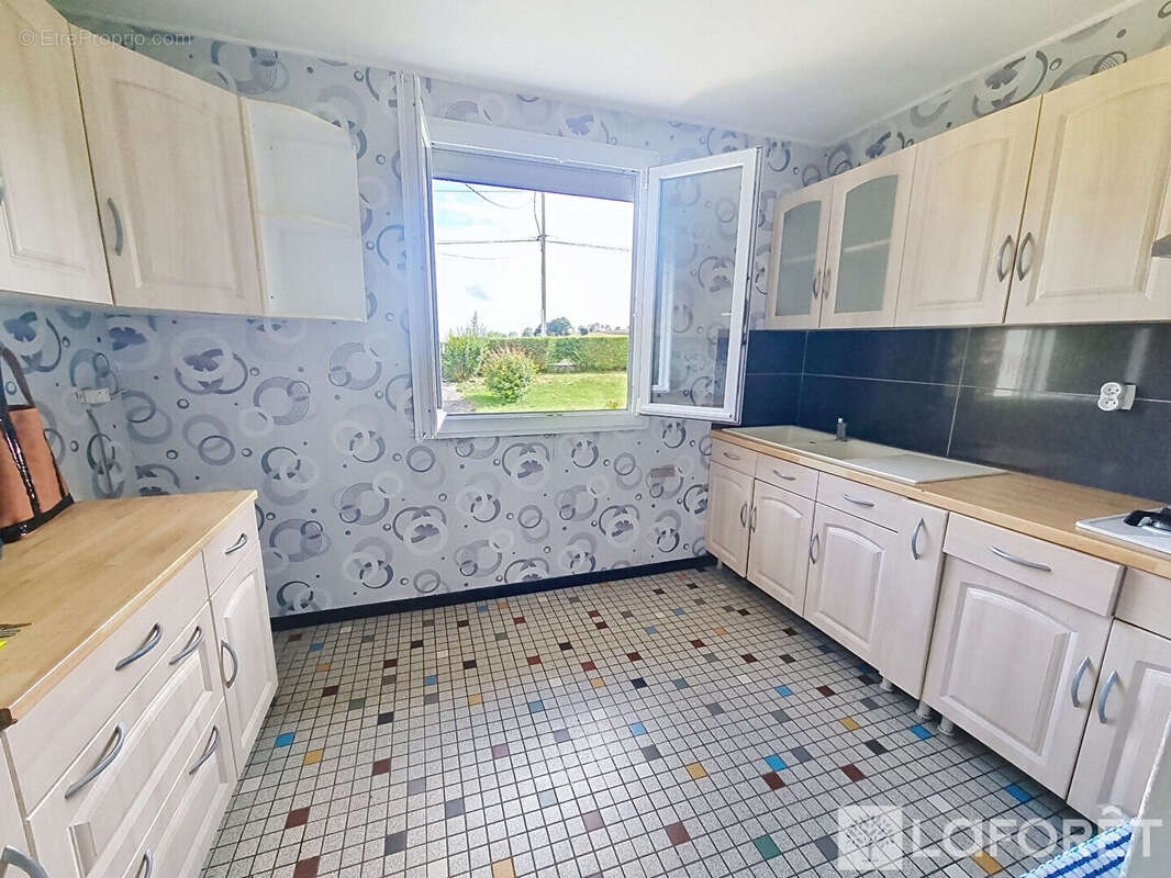 Maison à AMFREVILLE