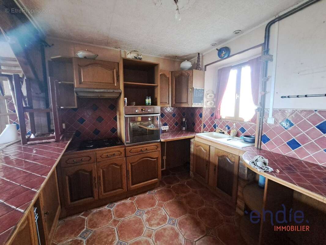 Maison à AINAY-LE-CHATEAU