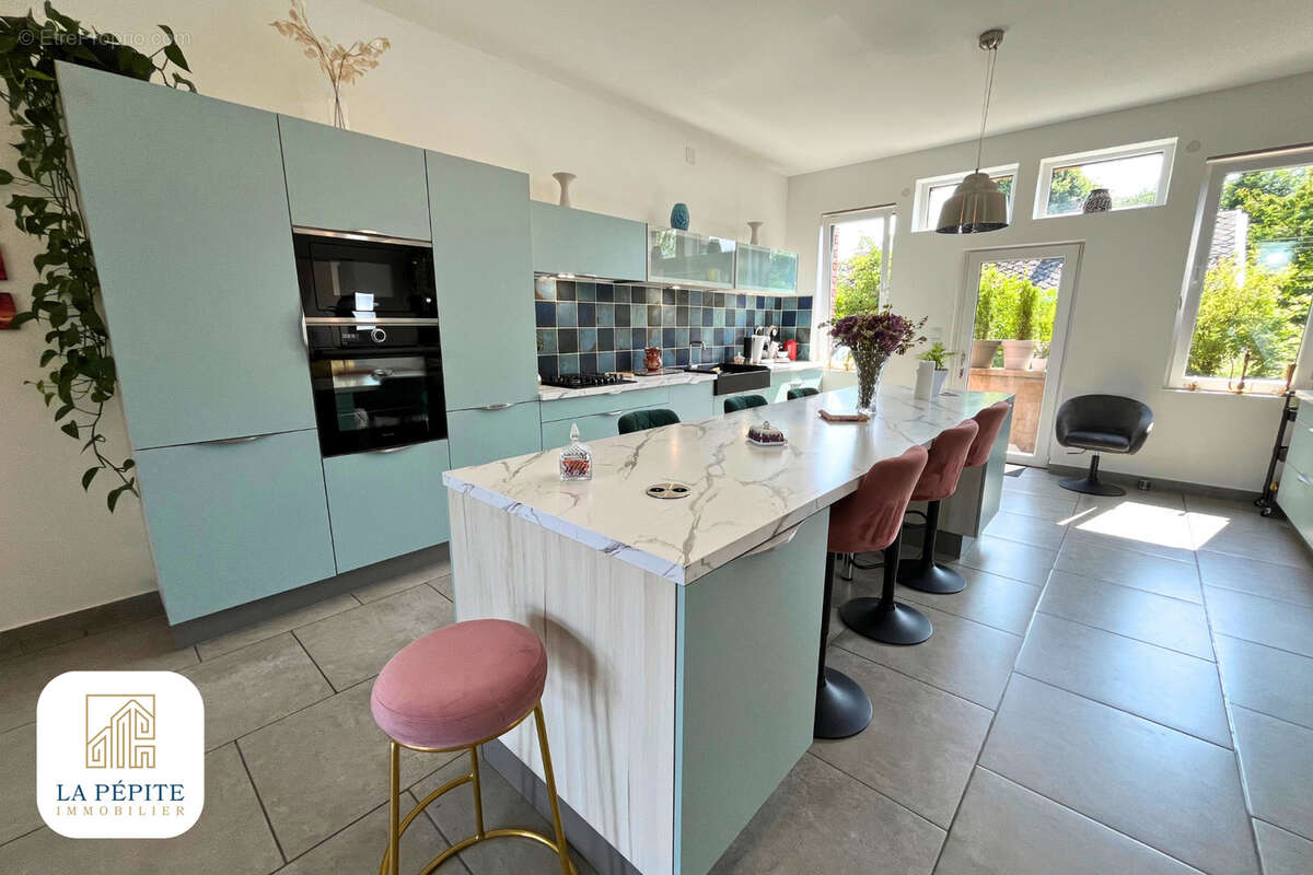 Maison à AULNOYE-AYMERIES