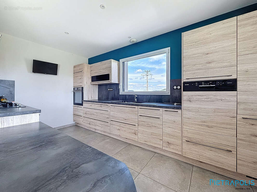 Maison à PONTCHARRA-SUR-TURDINE