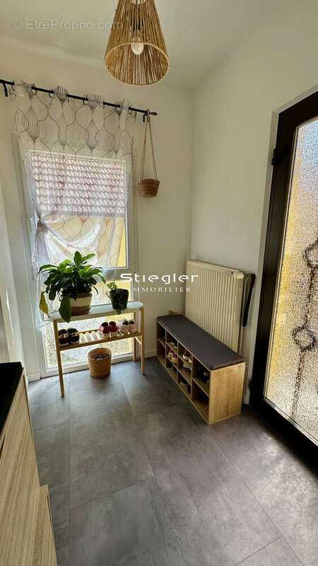 Dégagement d&#039;entrée - Maison à ILLKIRCH-GRAFFENSTADEN