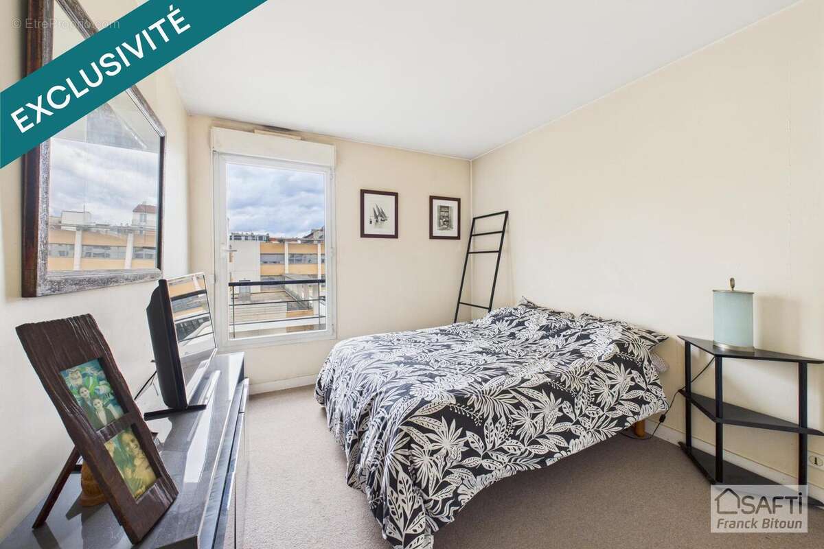 Photo 6 - Appartement à COURBEVOIE