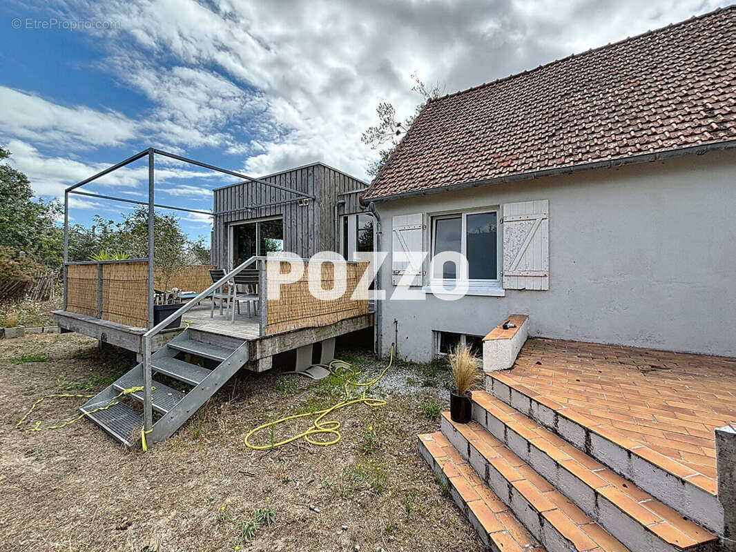 Maison à AGON-COUTAINVILLE