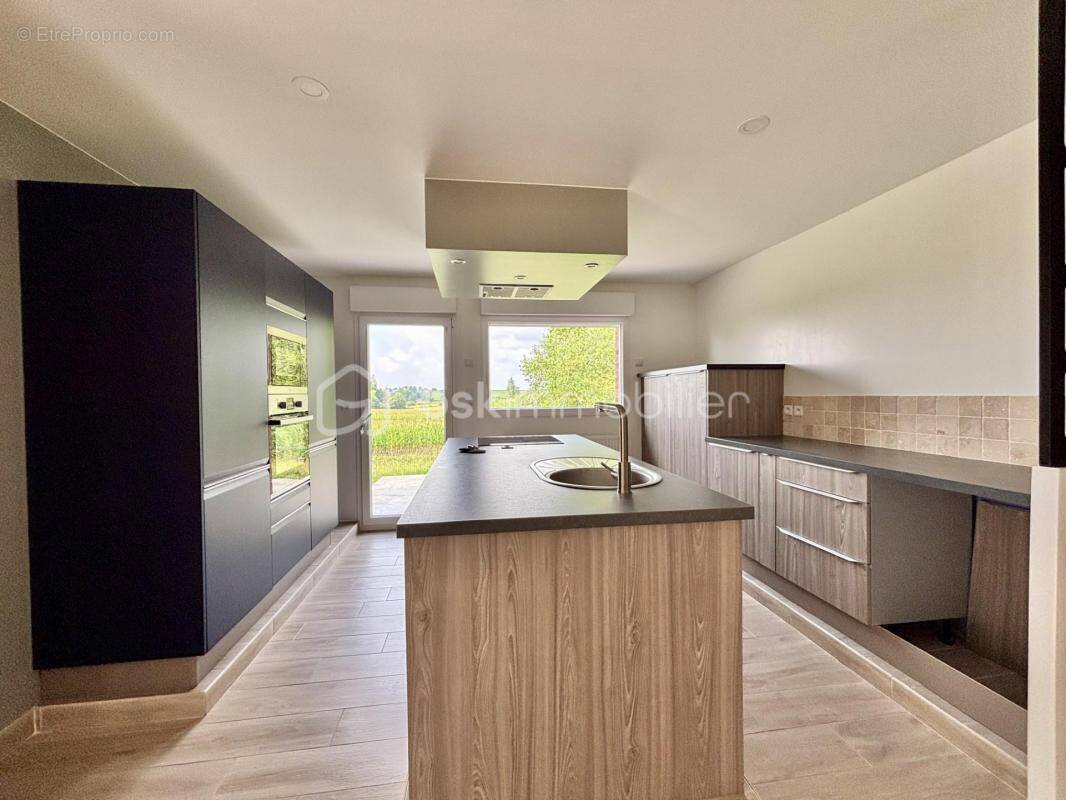 Maison à DOUCHY-LES-MINES