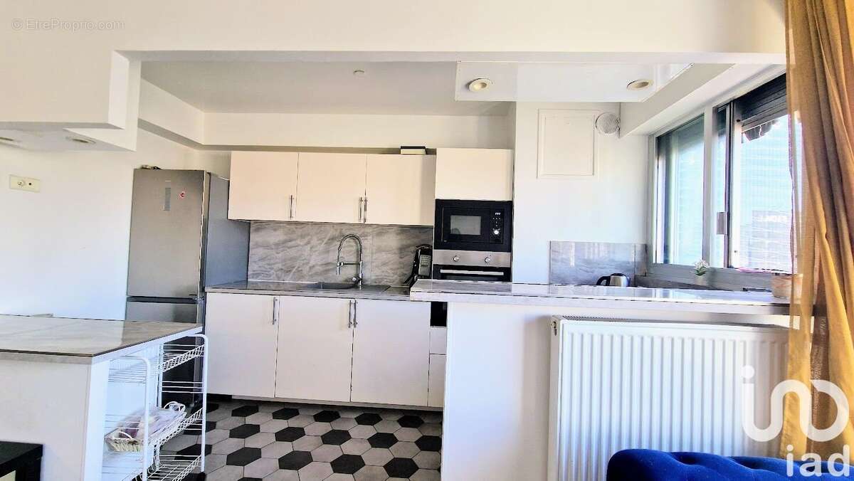 Photo 4 - Appartement à COURBEVOIE