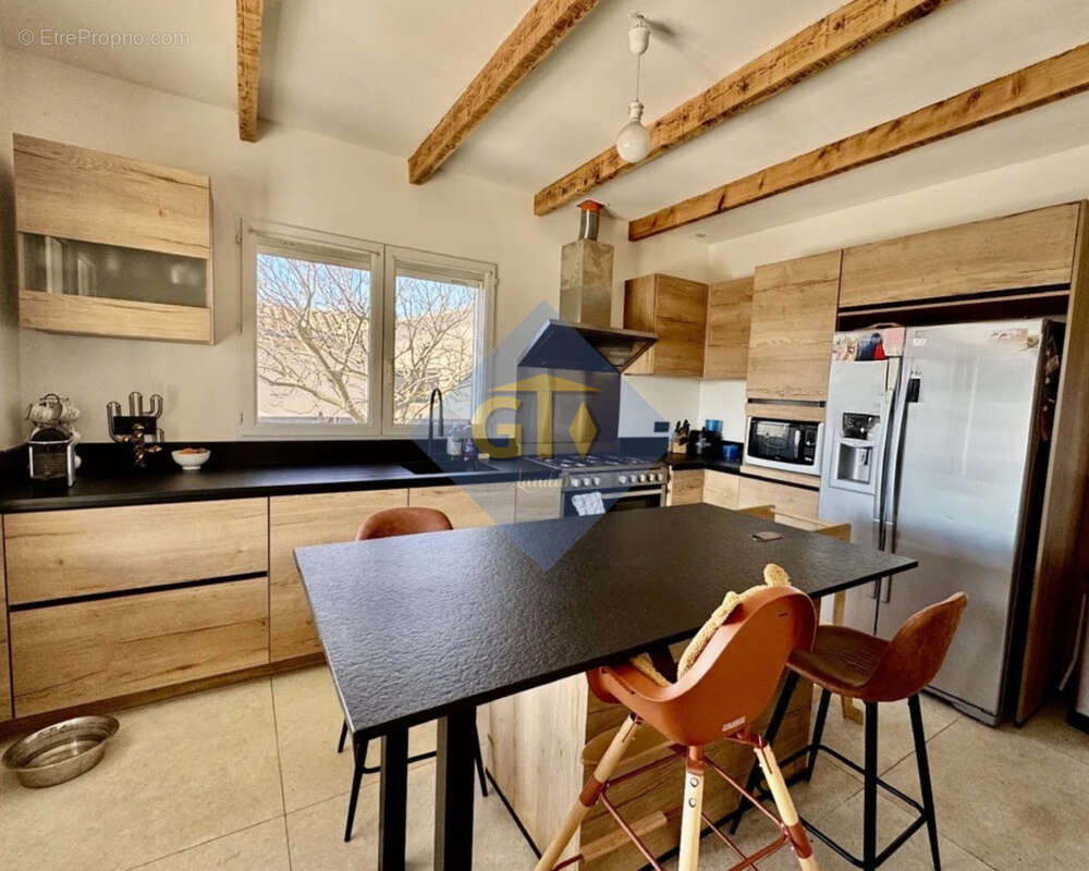 Maison à LAUDUN-L&#039;ARDOISE