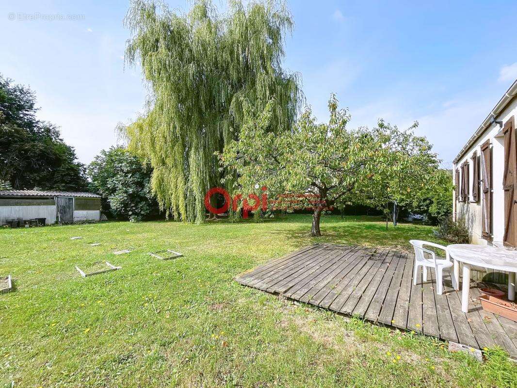 Maison à MOGNEVILLE