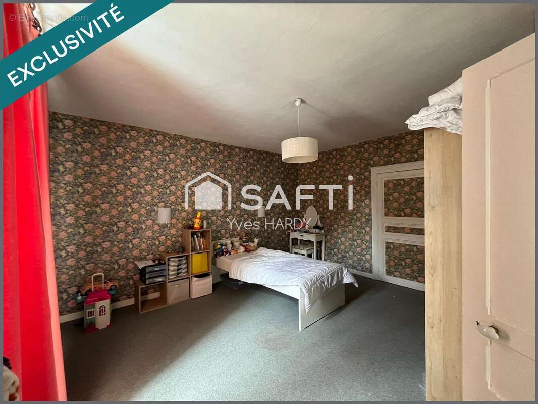 Photo 6 - Maison à LES LANDES-GENUSSON