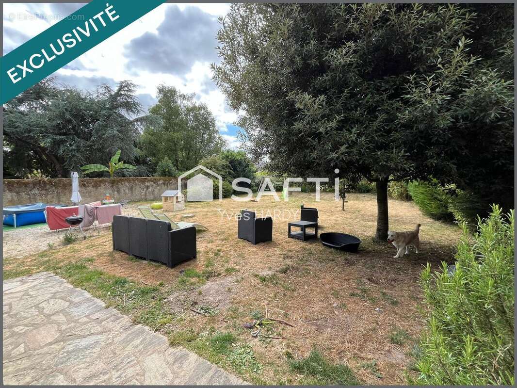 Photo 9 - Maison à LES LANDES-GENUSSON