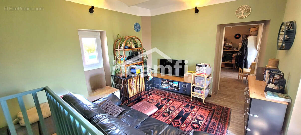 Maison à SAINT-JULIEN-LES-ROSIERS