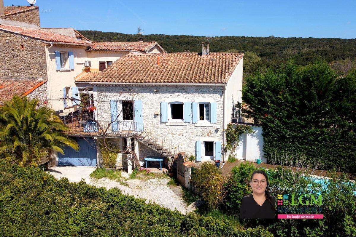 Maison à SAINT-JULIEN-LES-ROSIERS