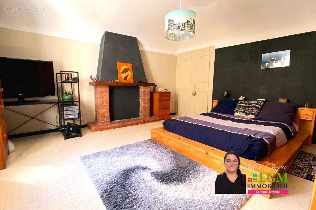 Maison à SAINT-JULIEN-LES-ROSIERS