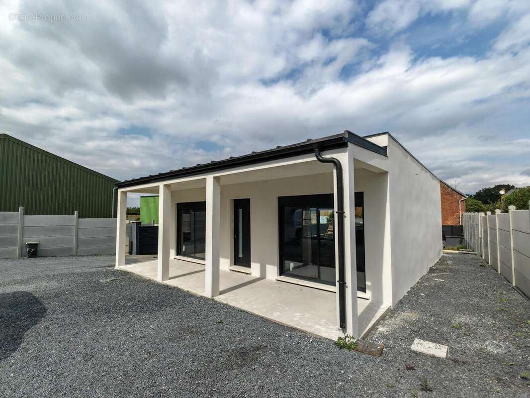 Photo 2 - Maison à POIX-DU-NORD